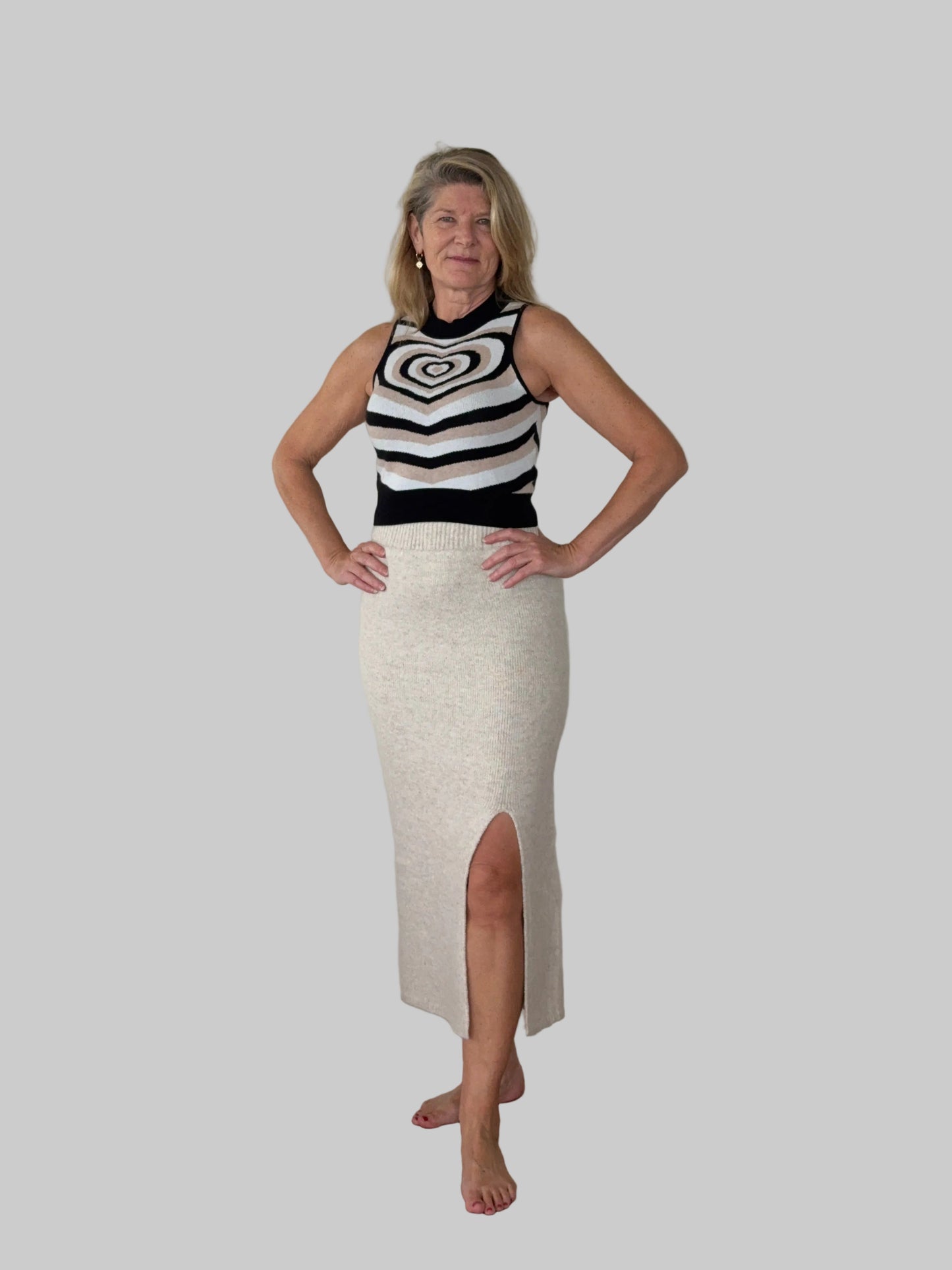 Women's sleeveless heart print stretch knit top in black white and cream - doesn't show visible sweat marks - Cheeky Goddess Australia