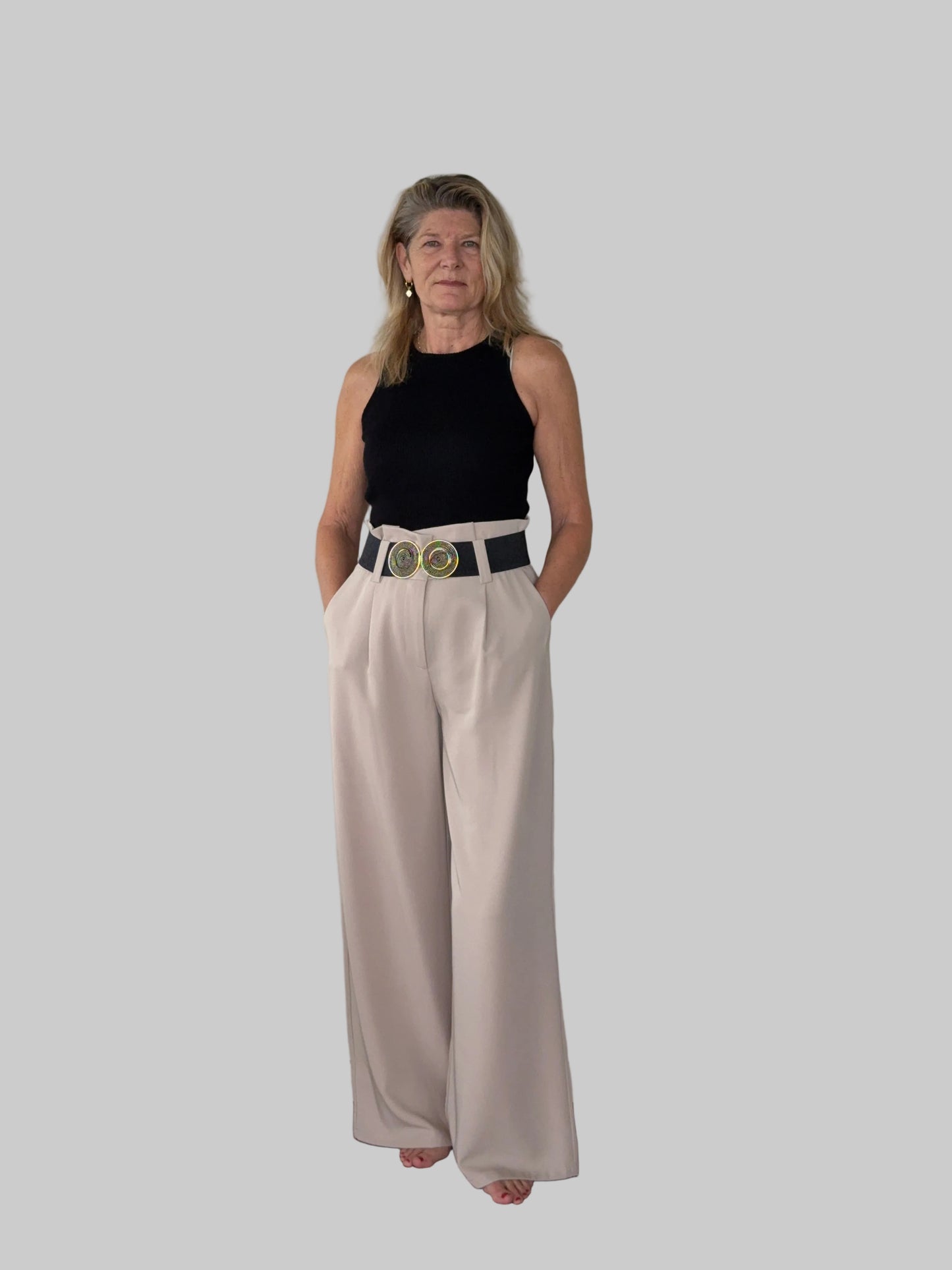 Beige paper bag waist pants women - front view - flattering wide leg - with wide belt and black tank top - Cheeky Goddess Australia