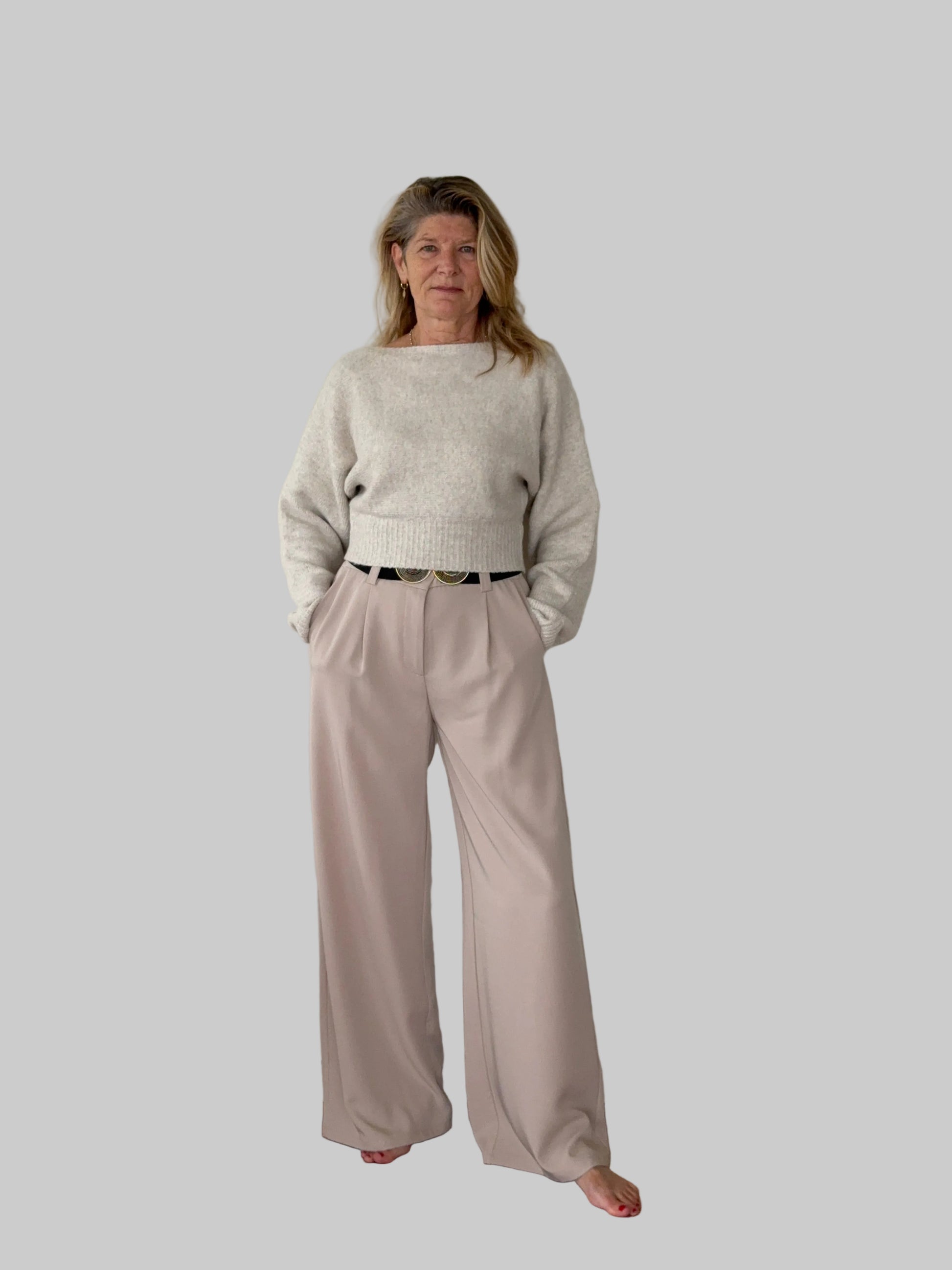 Oversized batwing knit top with boat neck -women - styled with beige wide leg pants - front view - Cheeky Goddess Australia