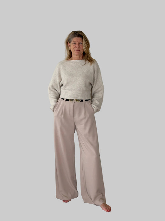 Oversized batwing knit top with boat neck -women - styled with beige wide leg pants - front view - Cheeky Goddess Australia