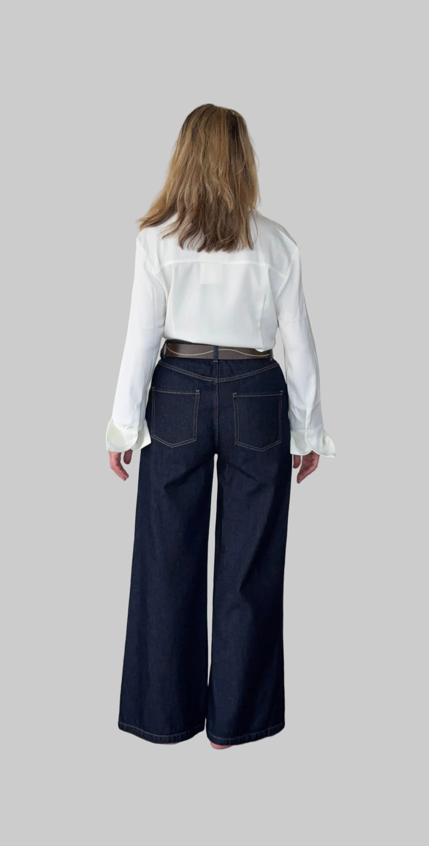 White long sleeve shirt women Australia - doesn't show sweat. Flare cuff, cinched waist. Tucked into jeans with belt. Back view. Tested in real life. Cheeky Goddess.