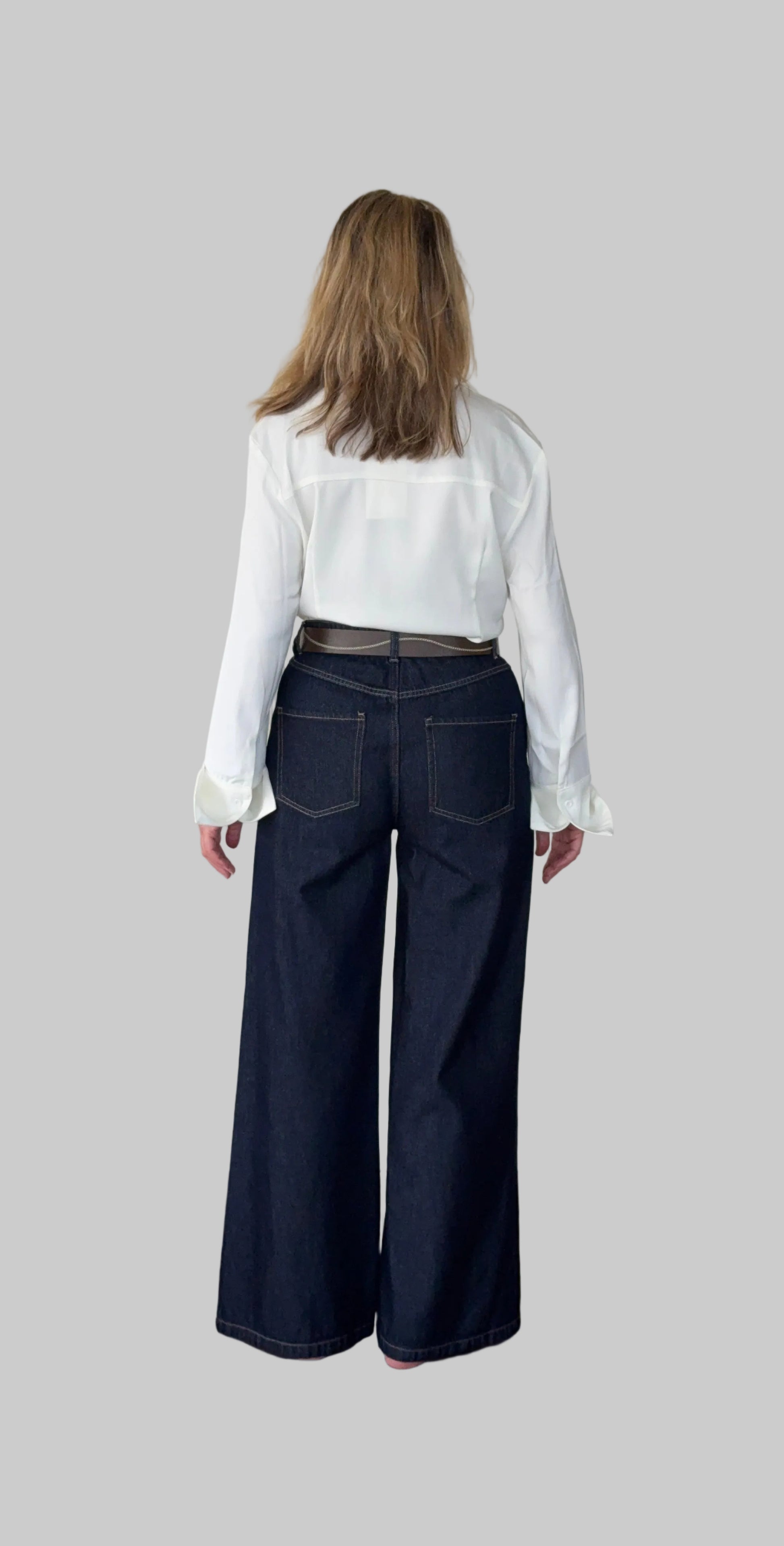 White long sleeve shirt women Australia - doesn't show sweat. Flare cuff, cinched waist. Tucked into jeans with belt. Back view. Tested in real life. Cheeky Goddess.