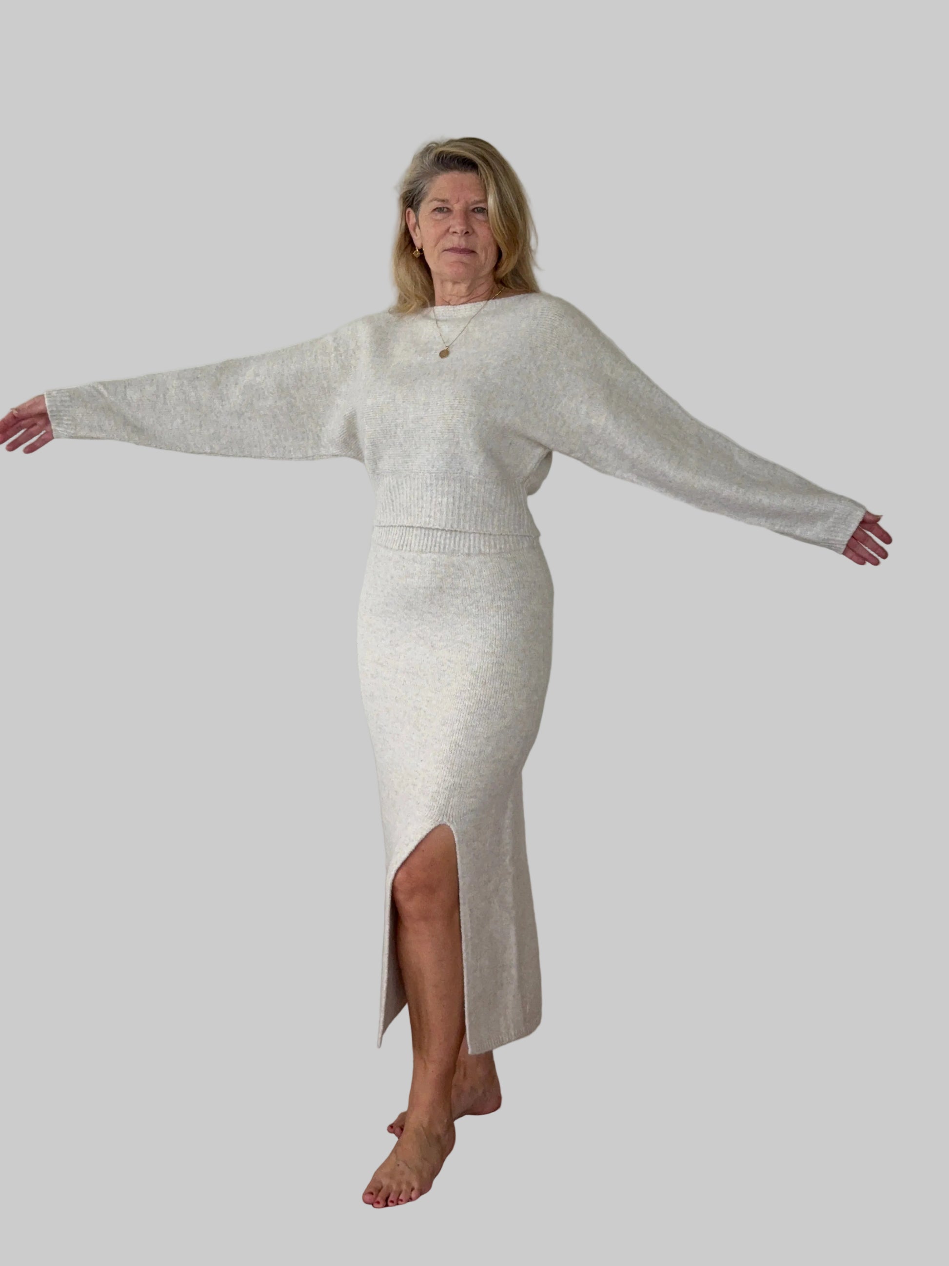 Oversized oatmeal colored batwing knit top with boat neck - women - styled with oatmeal split skirt - front view - Cheeky Goddess Australia