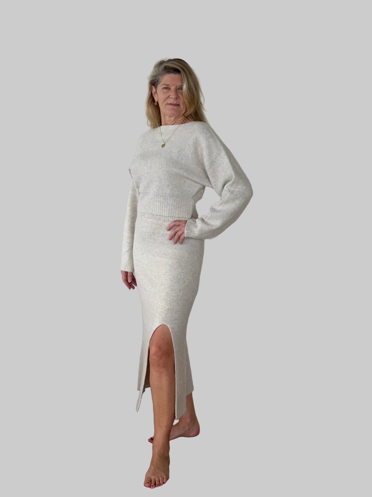 Oversized oatmeal colored batwing knit top with boat neck -women - styled with front split oatmeal knit skirt - side view - Cheeky Goddess Australia