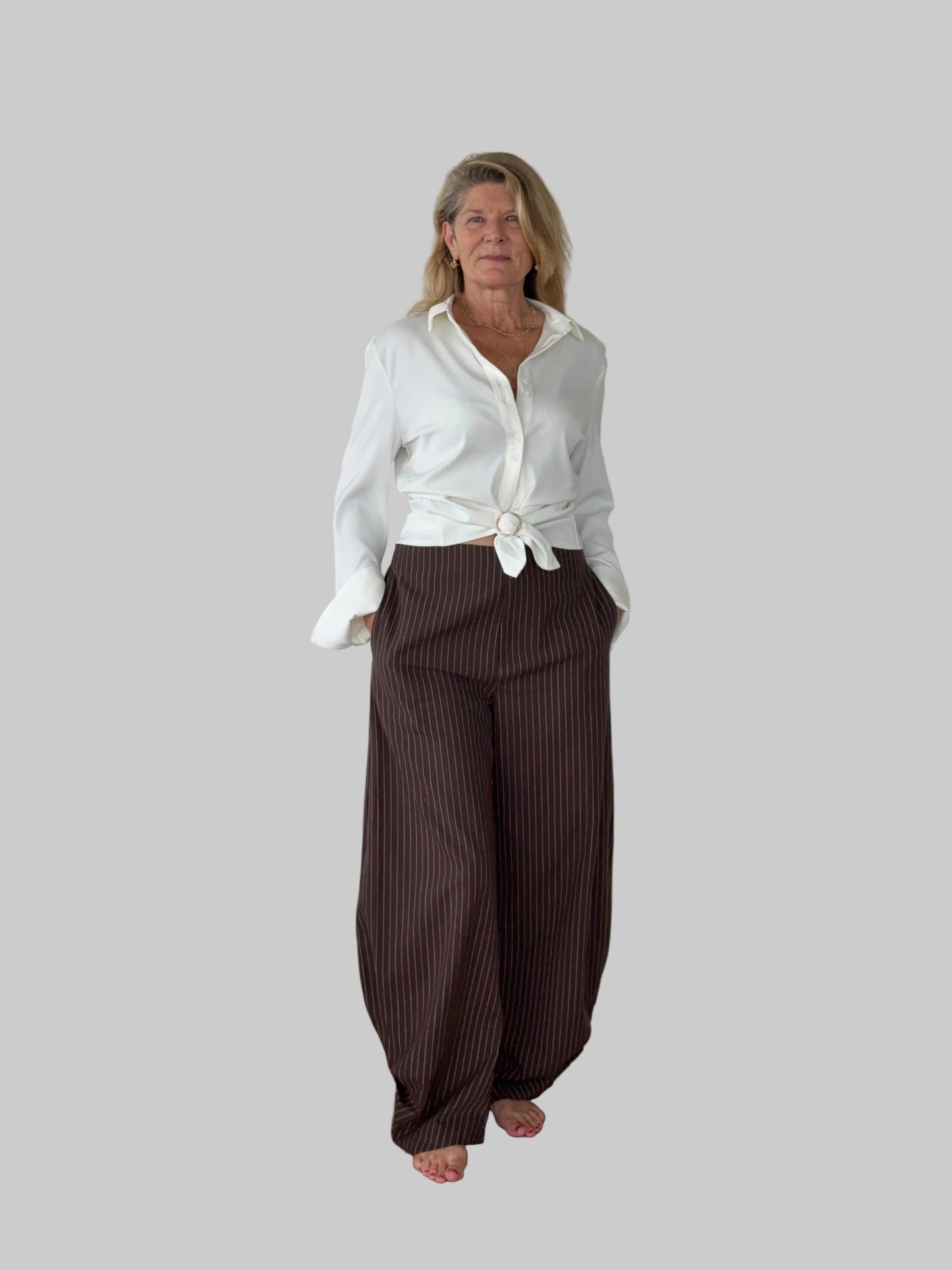 Brown linen pants styled with white shirt - women over 50 Australia - Cheeky Goddess