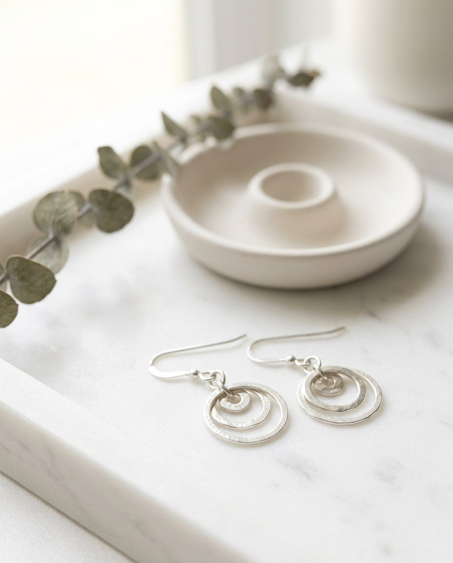 Dangle earrings — Vanity Lifestyle | Generated by Modelize sterling silver Three circled charm earrings on fishhook earwires cheeky goddess.