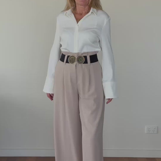White long sleeve shirt women Australia - doesn't show sweat. Flare cuff, cinched waist. Tucked into brown pants.  Tested in real life. Cheeky Goddess.