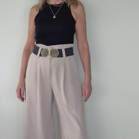 Video of woman in black knit tank top with beige wide leg tailored pants with black belt.  Cheeky Goddess - Vida size 14 Australia
