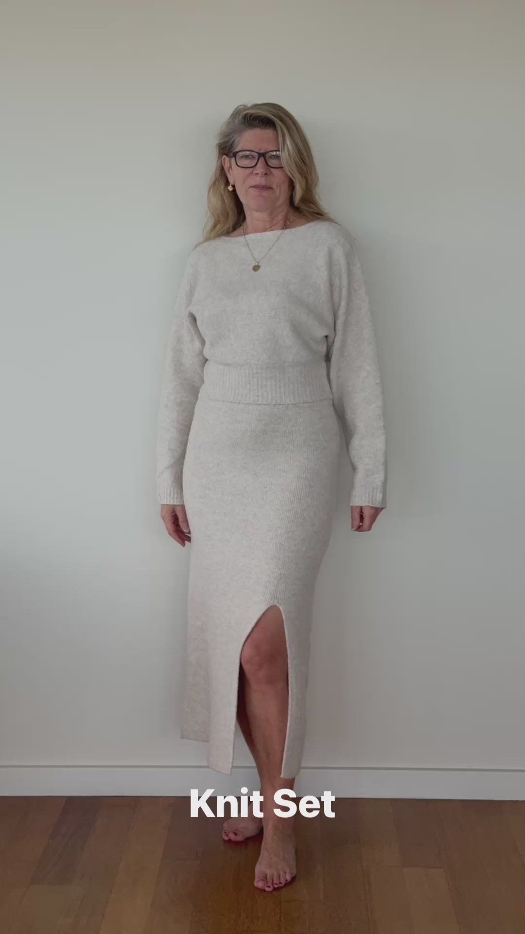 Video of woman in an oatmeal coloured knit set of long sleeved top and skirt with split.  Cheeky Goddess - Vida size 14 Australia